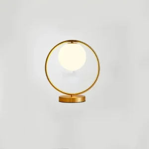 Lampe led ronde a poser métal doré et boule en verre.